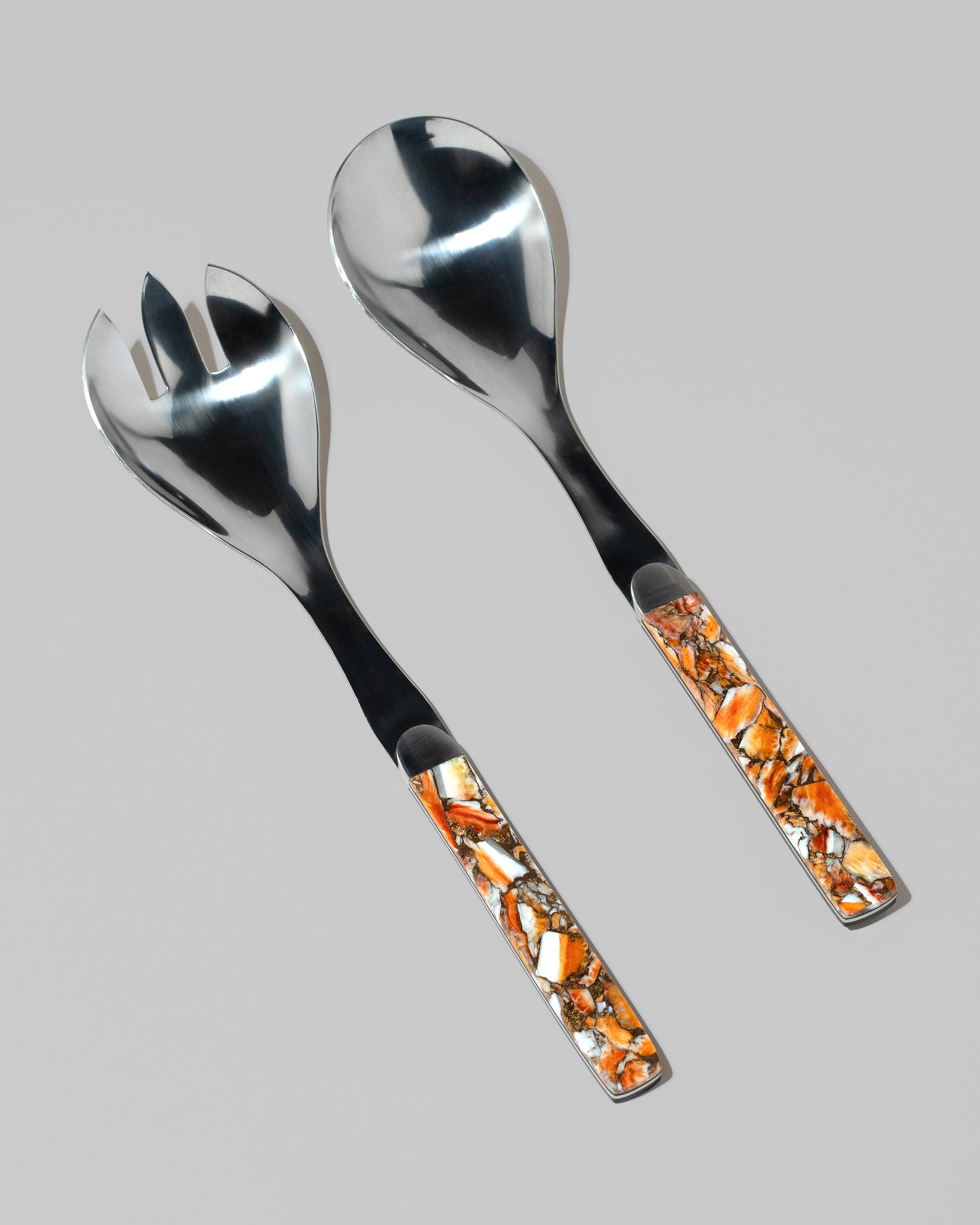 Santa Fe Stoneworks Spiney Oyster Salad Serving Set on light color background.