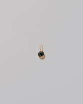 Bicolor Sapphire Pendant on light color background.