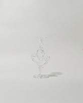 Silje Lindrup Eight Glass Candle Holder on light color background.