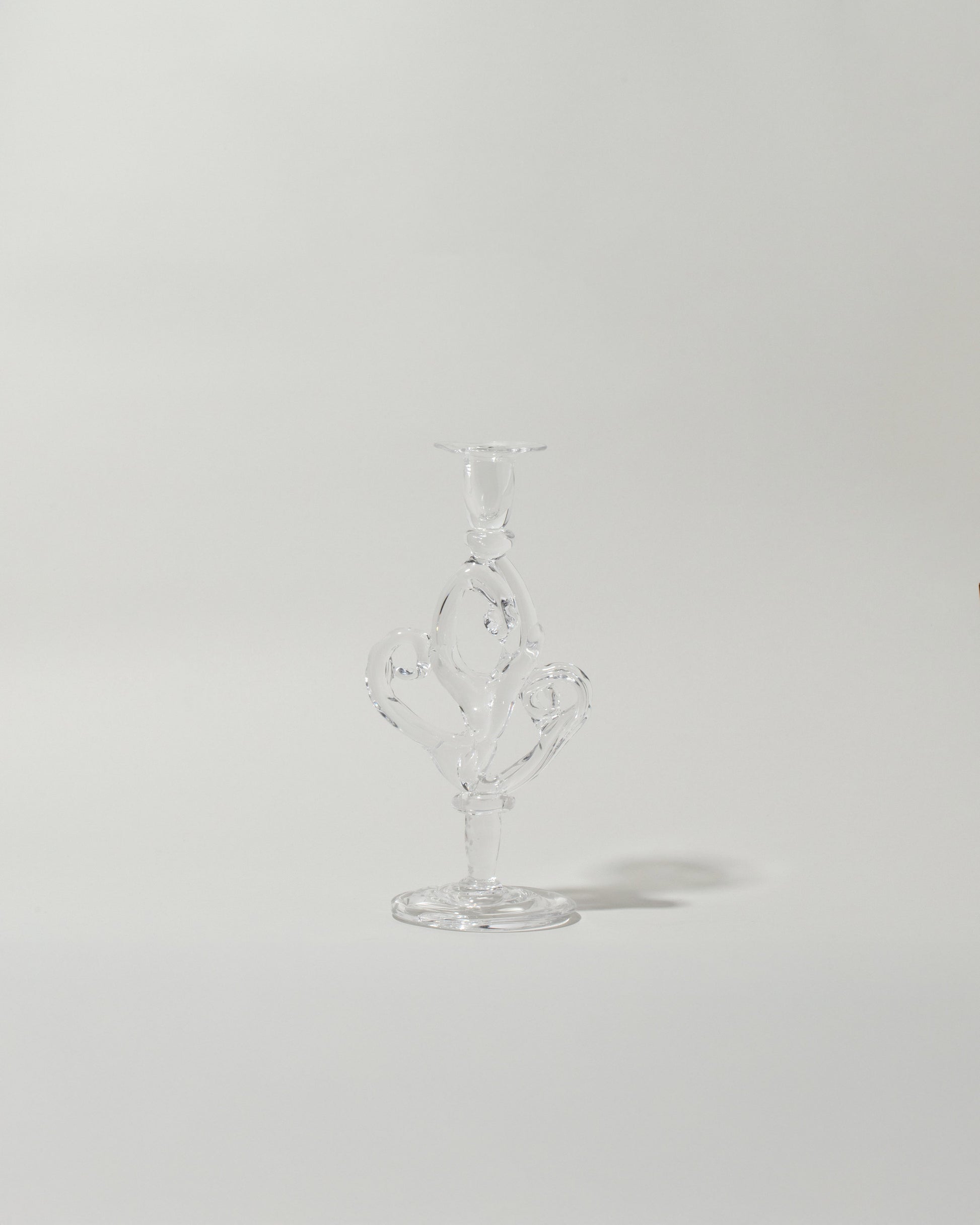 Silje Lindrup Eight Glass Candle Holder on light color background.