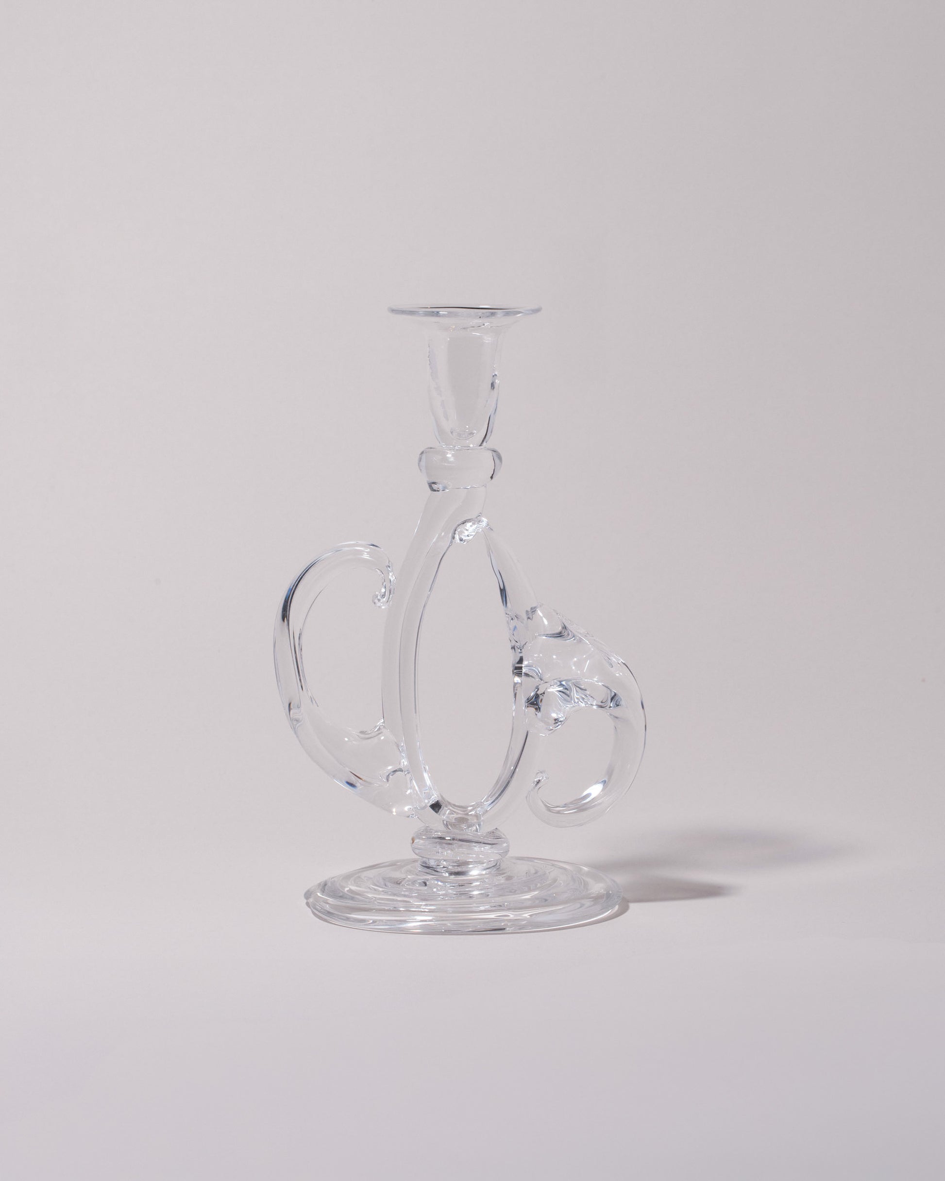 Silje Lindrup Nine Glass Candle Holder on light color background.