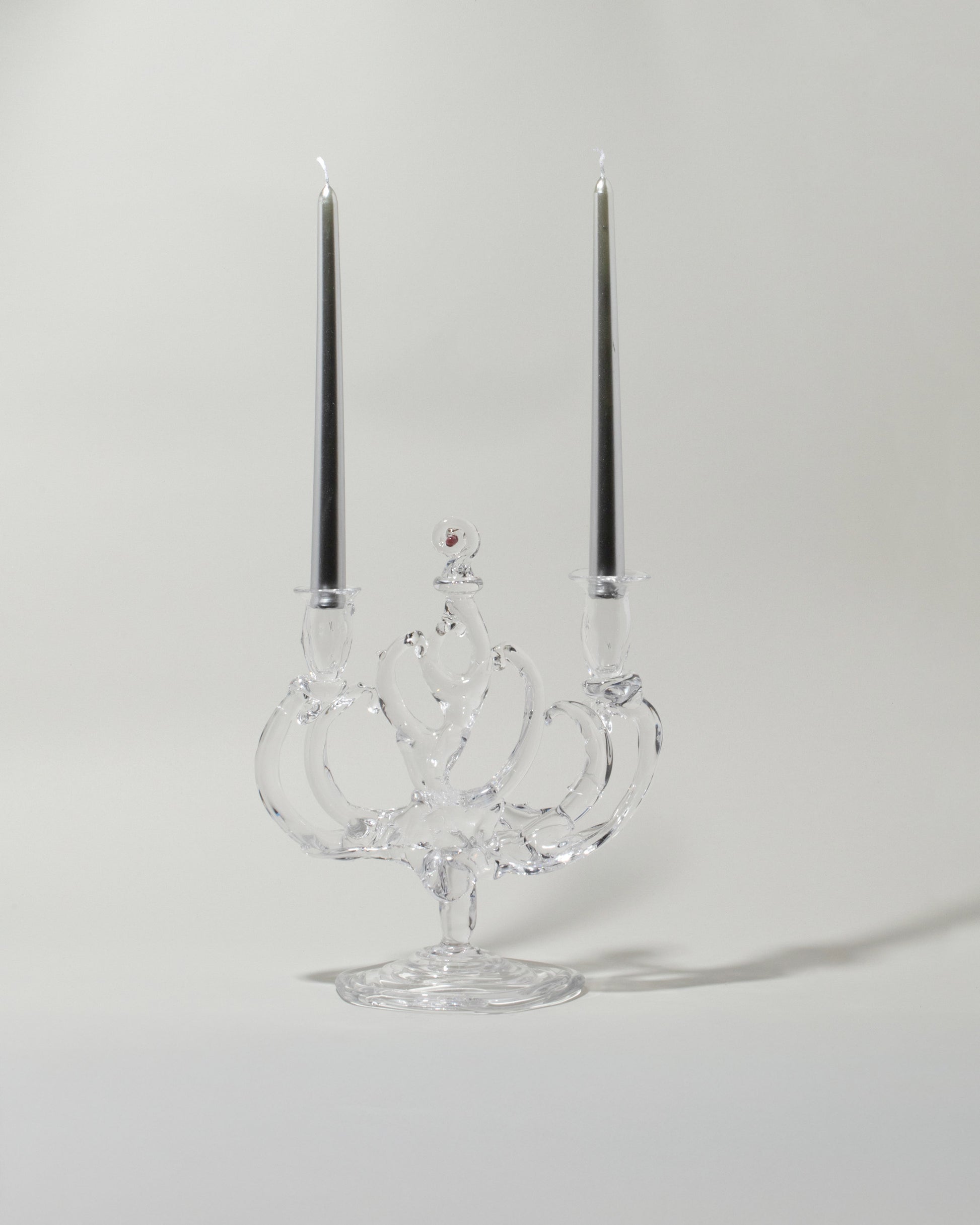 Detail view of the Silje Lindrup One Glass Candelabra on light color background. Tapers not included.