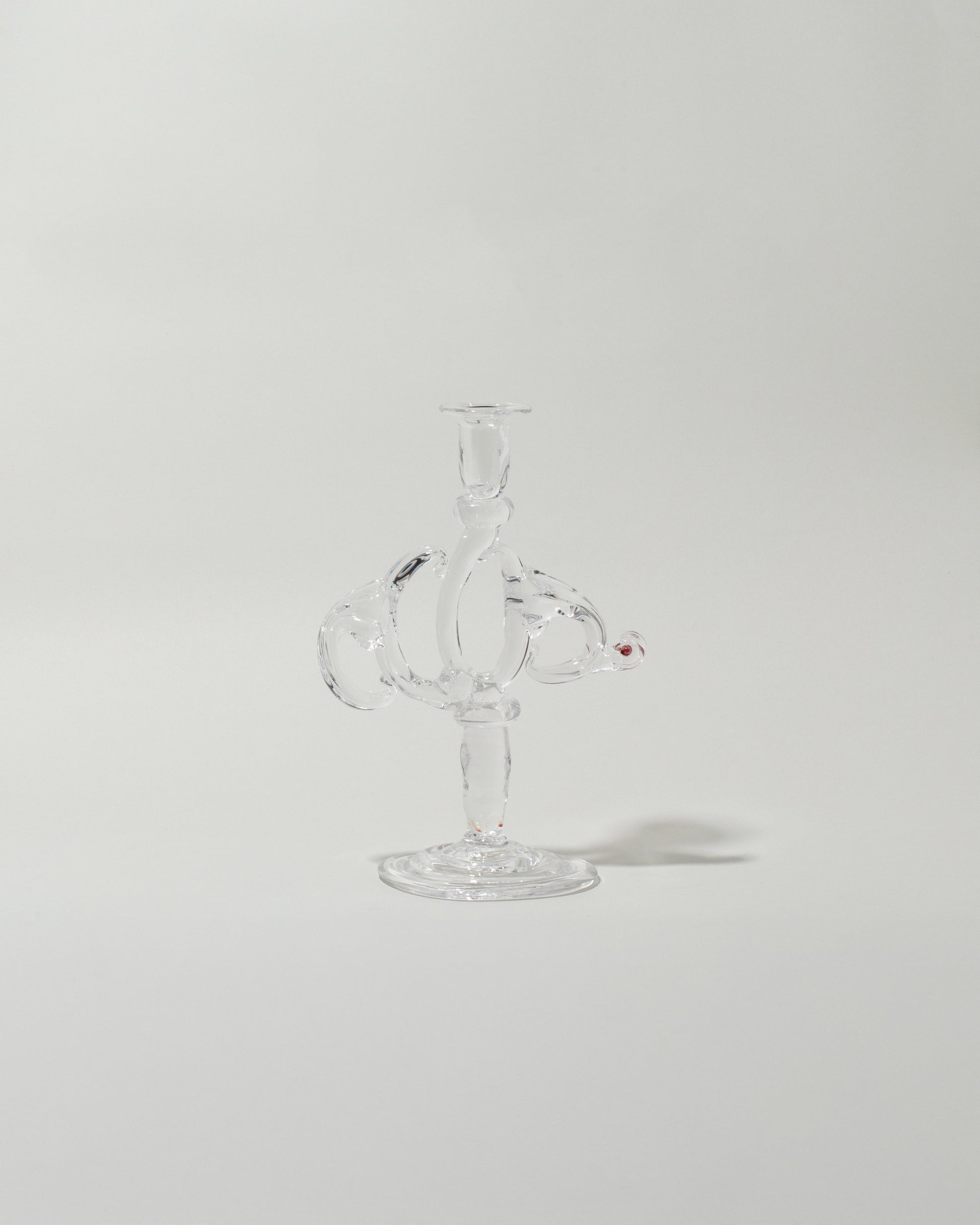 Silje Lindrup Seven Glass Candle Holder on light color background.