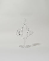 Silje Lindrup Six Glass Candle Holder on light color background.