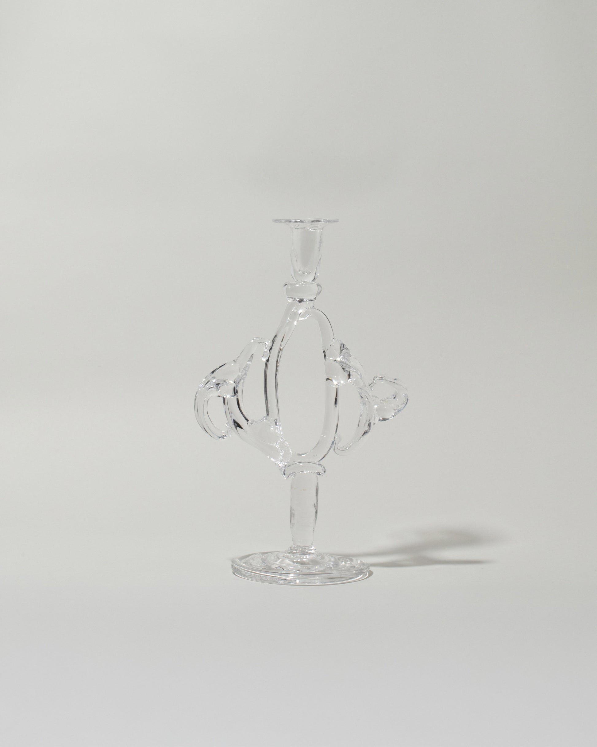 Silje Lindrup Six Glass Candle Holder on light color background.