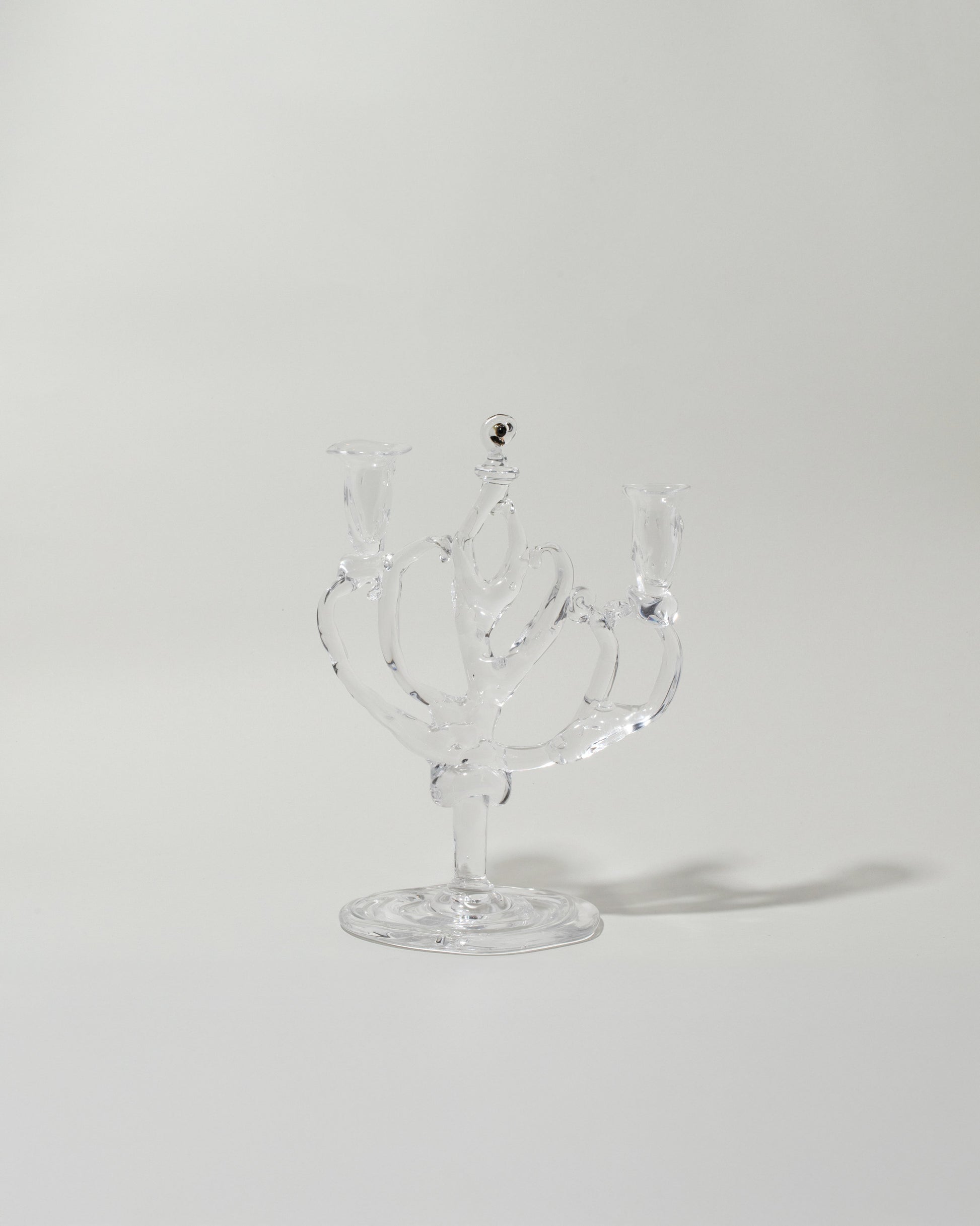 Silje Lindrup Three Glass Candelabra on light color background.