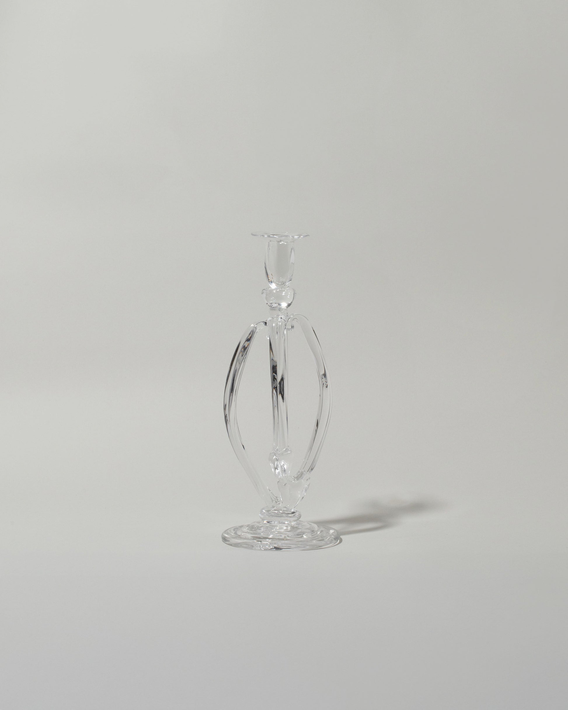 Silje Lindrup Three Glass Candle Holder on light color background.