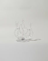 Silje Lindrup Two Glass Candelabra on light color background.