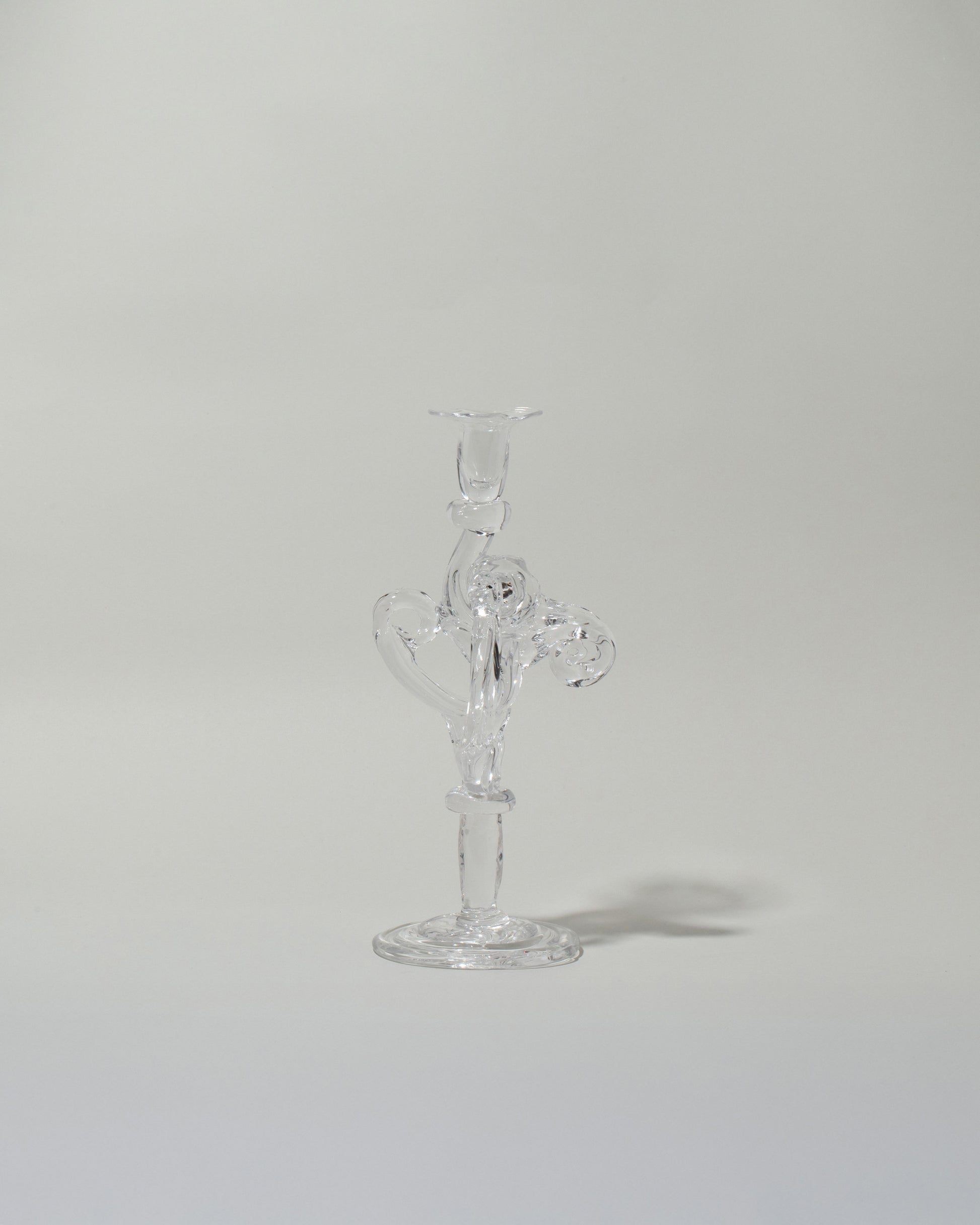 Silje Lindrup Two Glass Candle Holder on light color background.