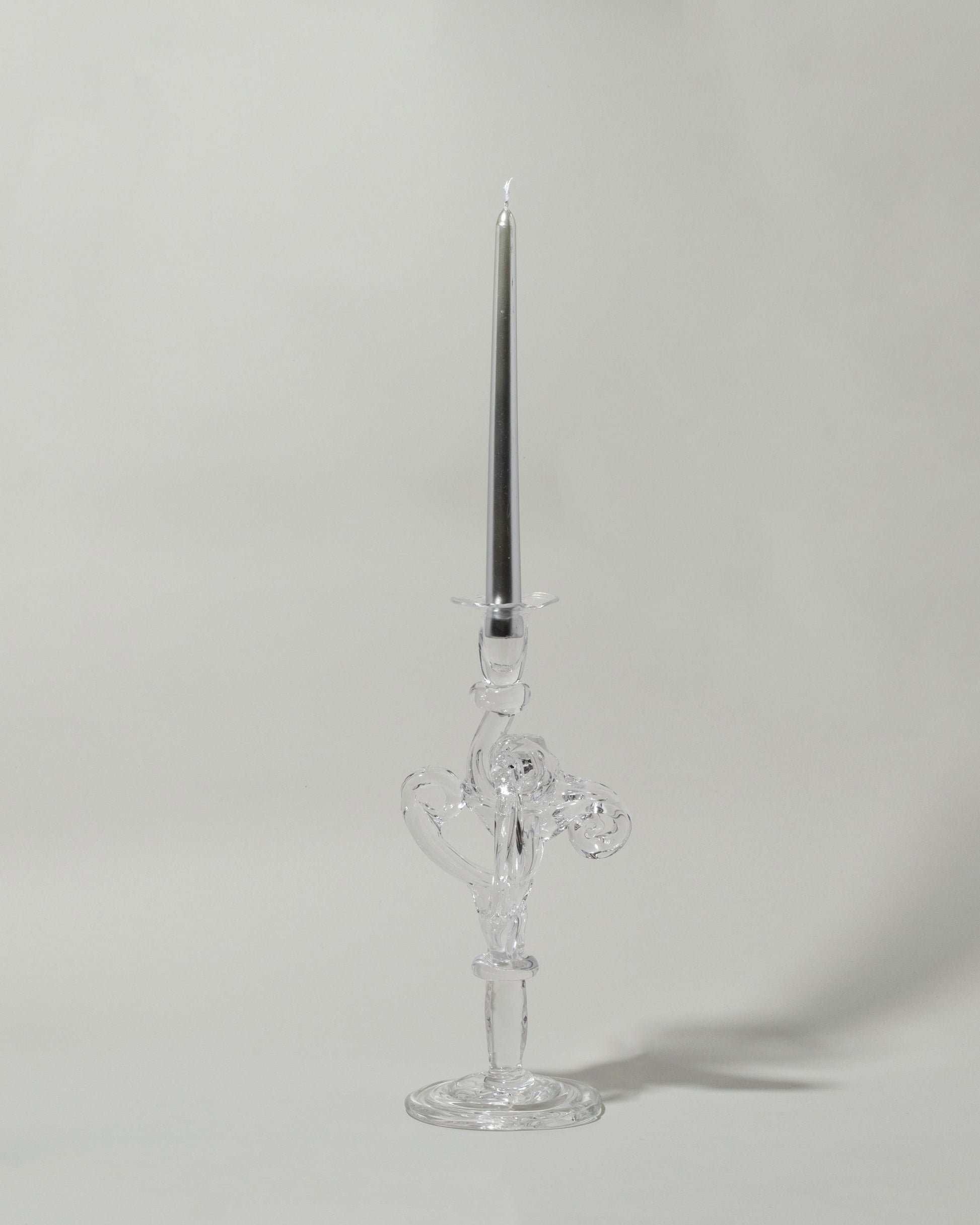 Detail view of the Silje Lindrup Two Glass Candle Holder on light color background. Taper not included.