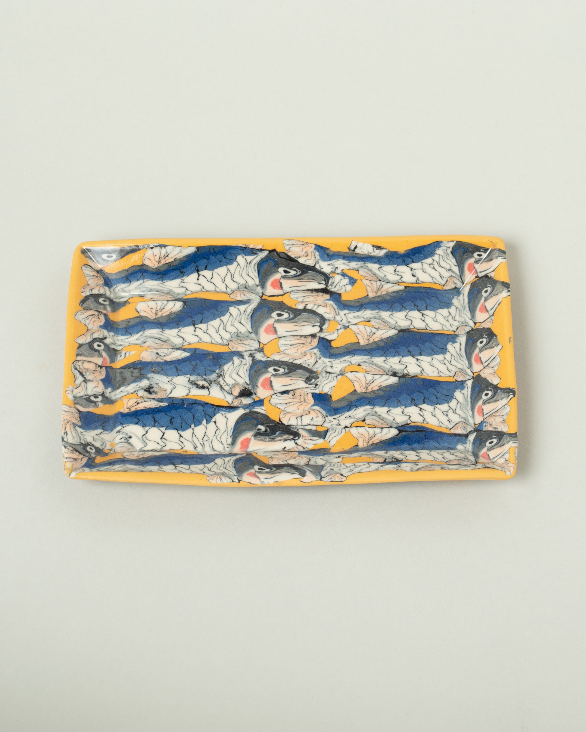 Slush Club Large Nerikomi Sardine Tray on light color background.