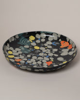 Closeup details of the Slush Club Nerikomi Platter No. 235 on light color background.