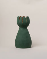 Stephanie Phillips Flower Sculpture on light color background.