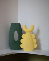 Stephanie Phillips Orta Tall Sculpture and Stephanie Phillips Dimanche Sculpture on light color background.