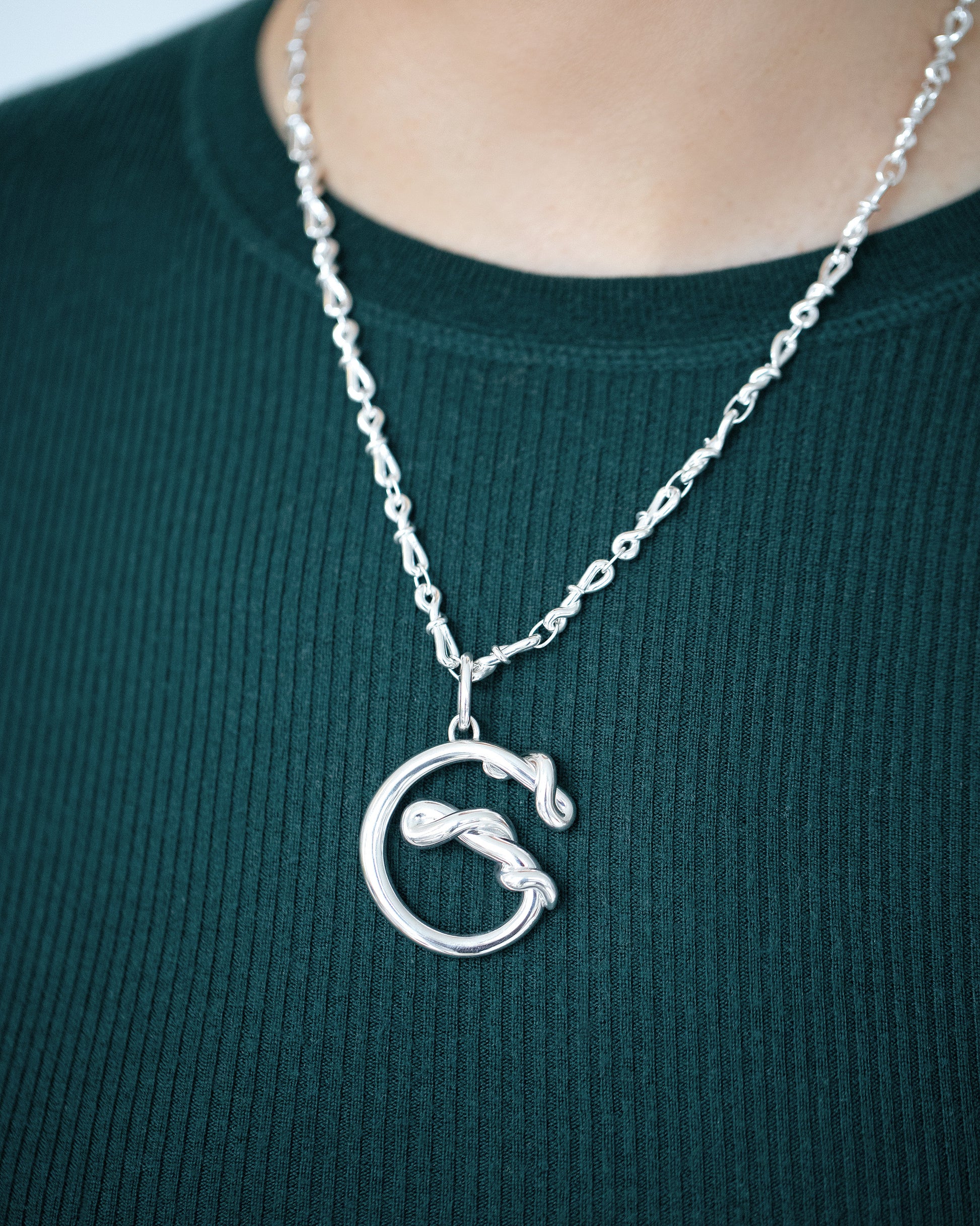 CRZM Sterling Silver Torsional Chain Necklace and CRZM Letter G Large Sterling Silver Letter Charm on model.