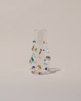Stover Glass Petite Cane Vase on light color background.