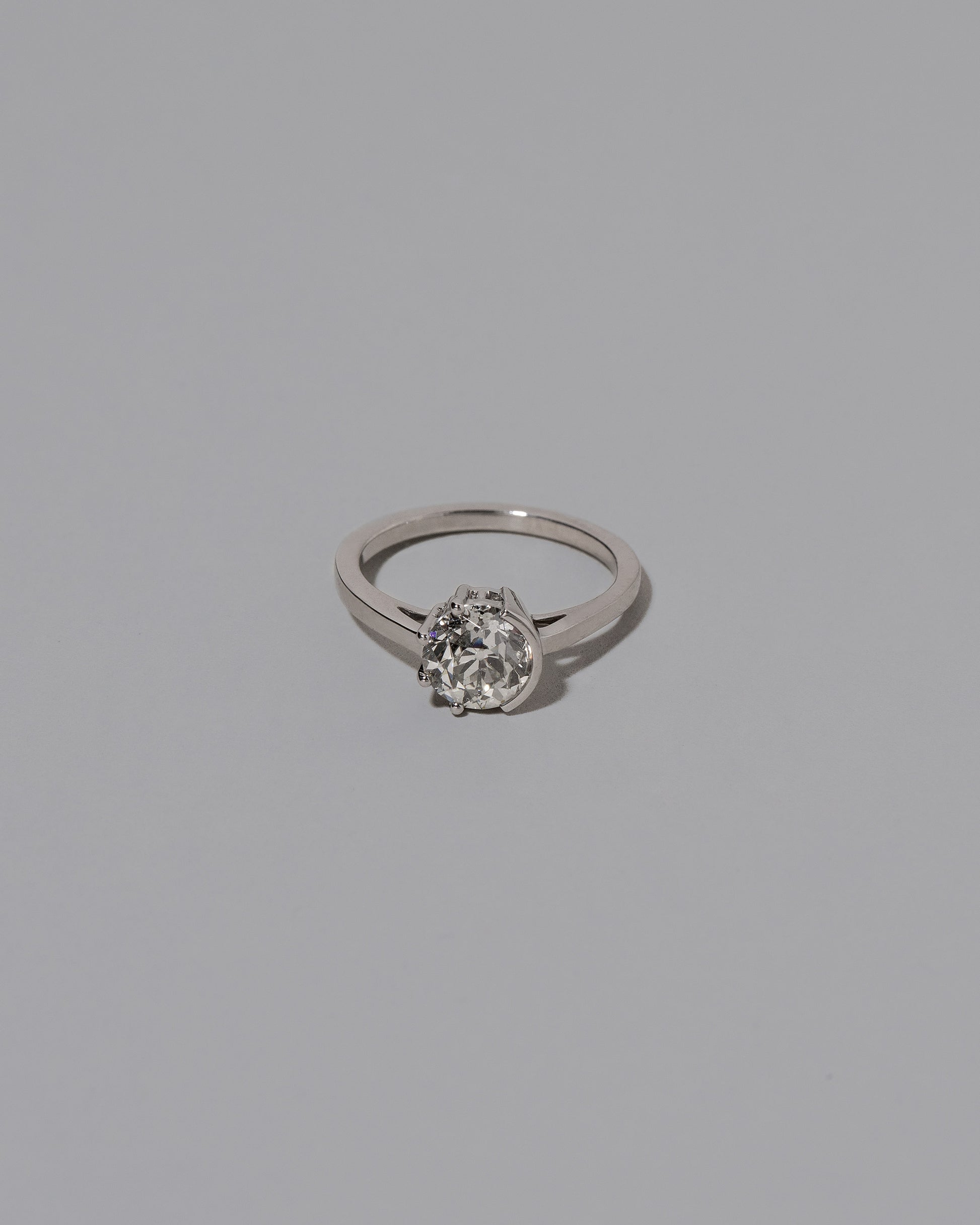 Platinum Sun & Moon Ring on light color background. Please note: This image represents a custom creation.