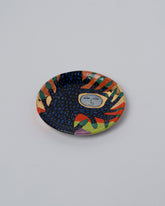 Suzanne Sullivan Moon A Continuous Scene Garden Party Dish on light color background.
