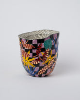 Suzanne Sullivan Alethiometer Blossom Vessel on light color background.