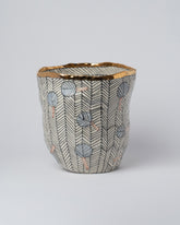 Suzanne Sullivan Alethiometer Stripe Tapered Vessel on light color background.