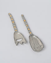 Suzanne Sullivan Conflict & Obstacle Grid Serving Set on light color background.