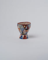Suzanne Sullivan One Arrange In Any Sequence Goblet on light color background.