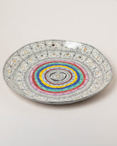 Inside view of the Suzanne Sullivan Frantically Seeking Happiness Platter on light color background.