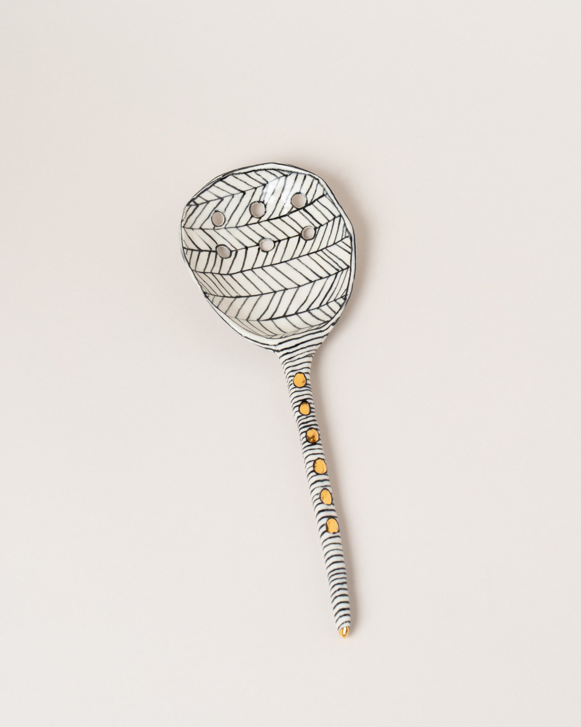 Suzanne Sullivan Three I Can Promise 8.5" Spoon on light color background.