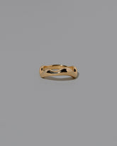 Gold Wide Fluctuating Band on light color background.