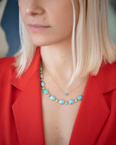 Eye See You Necklace and Visualization Necklace on model.