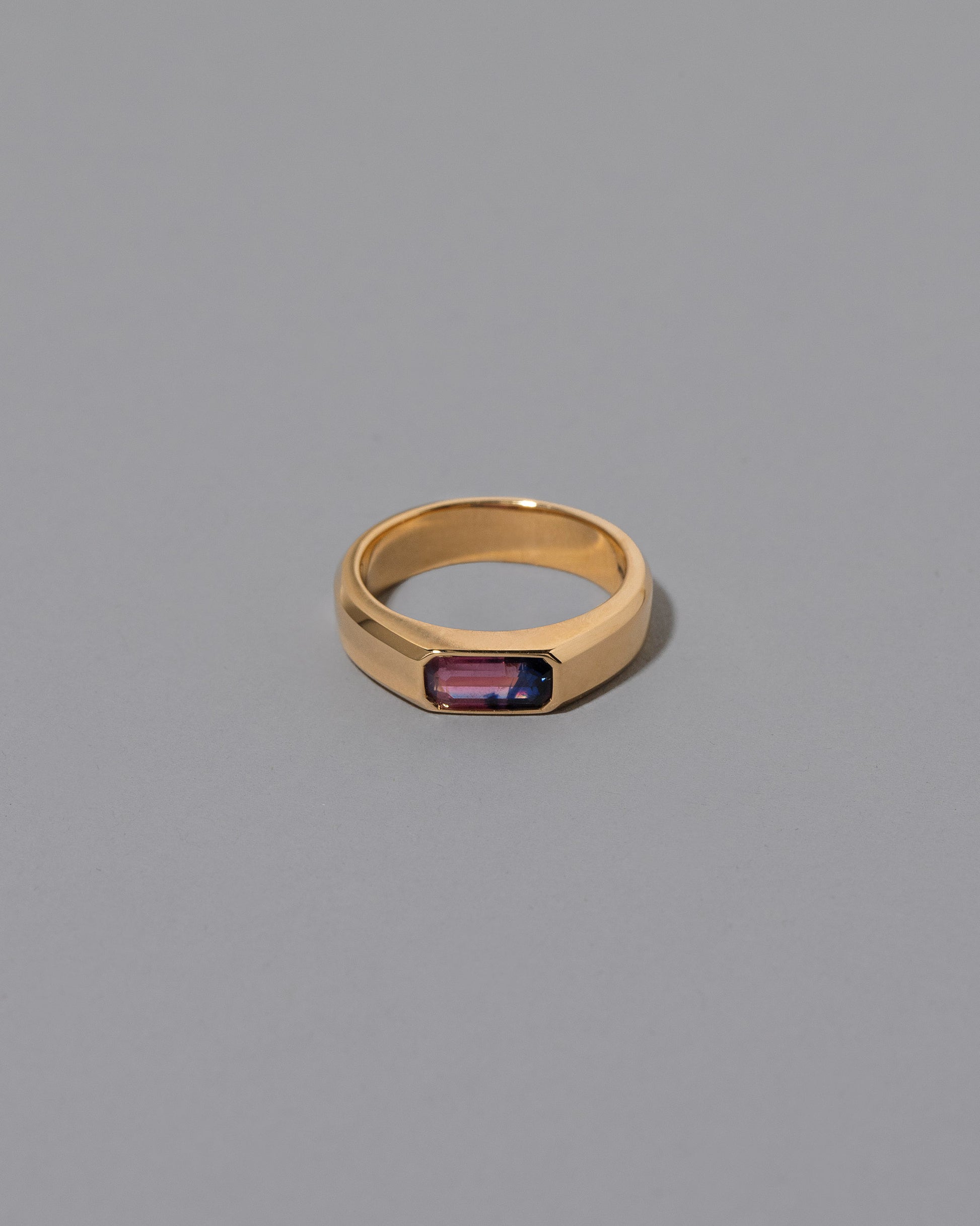 Wellspring Ring on light color background.
