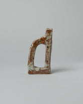 Willem van Hooff Rust Tiny Core Vessel on light color background.