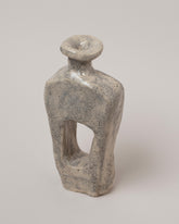 Closeup details of the Willem van Hooff Sandrift Tiny Core Vessel on light color background.