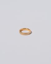 4mm Yellow 18K Outside and Platinum Inside Swimming Pool Band on light color background.