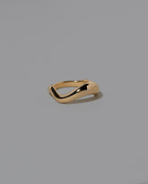 View from the side of the Gold Equate Band on light color background.