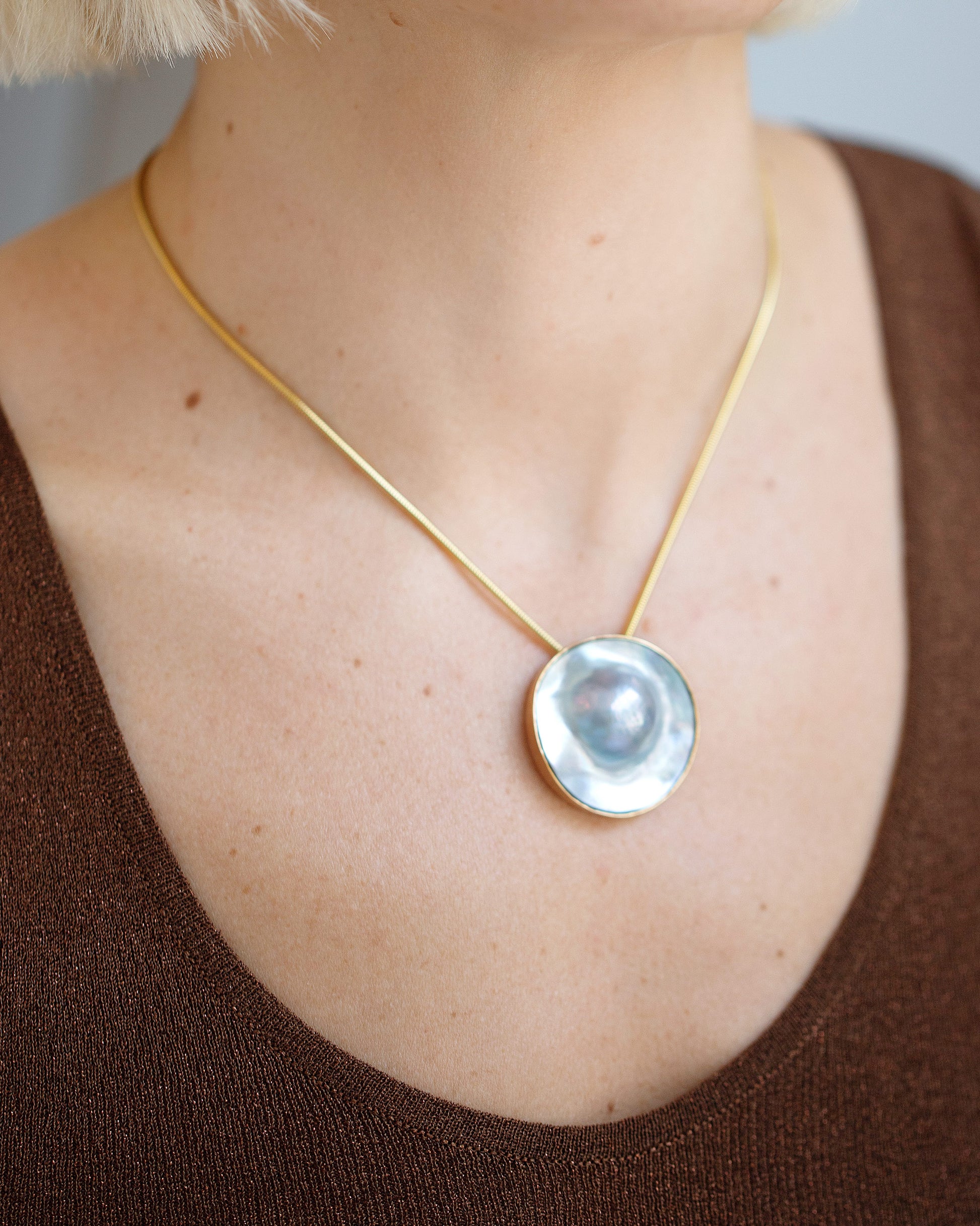 Seeing the Unseen Necklace on model.