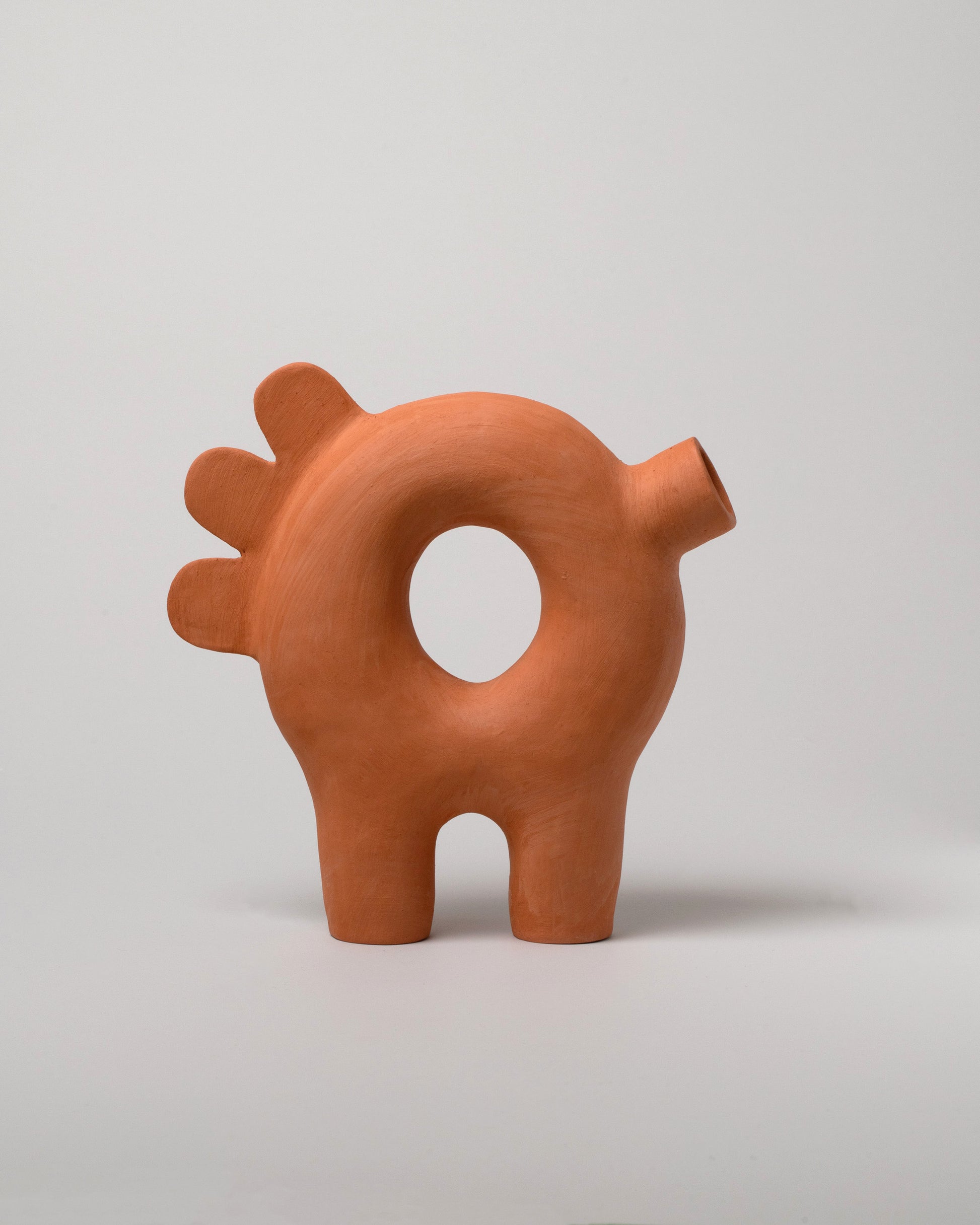 Stephanie Phillips Ferdi Sculpture on light color background.