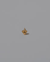 Closeup details of the Lotus Blossom Stud Earring Single on light color background.