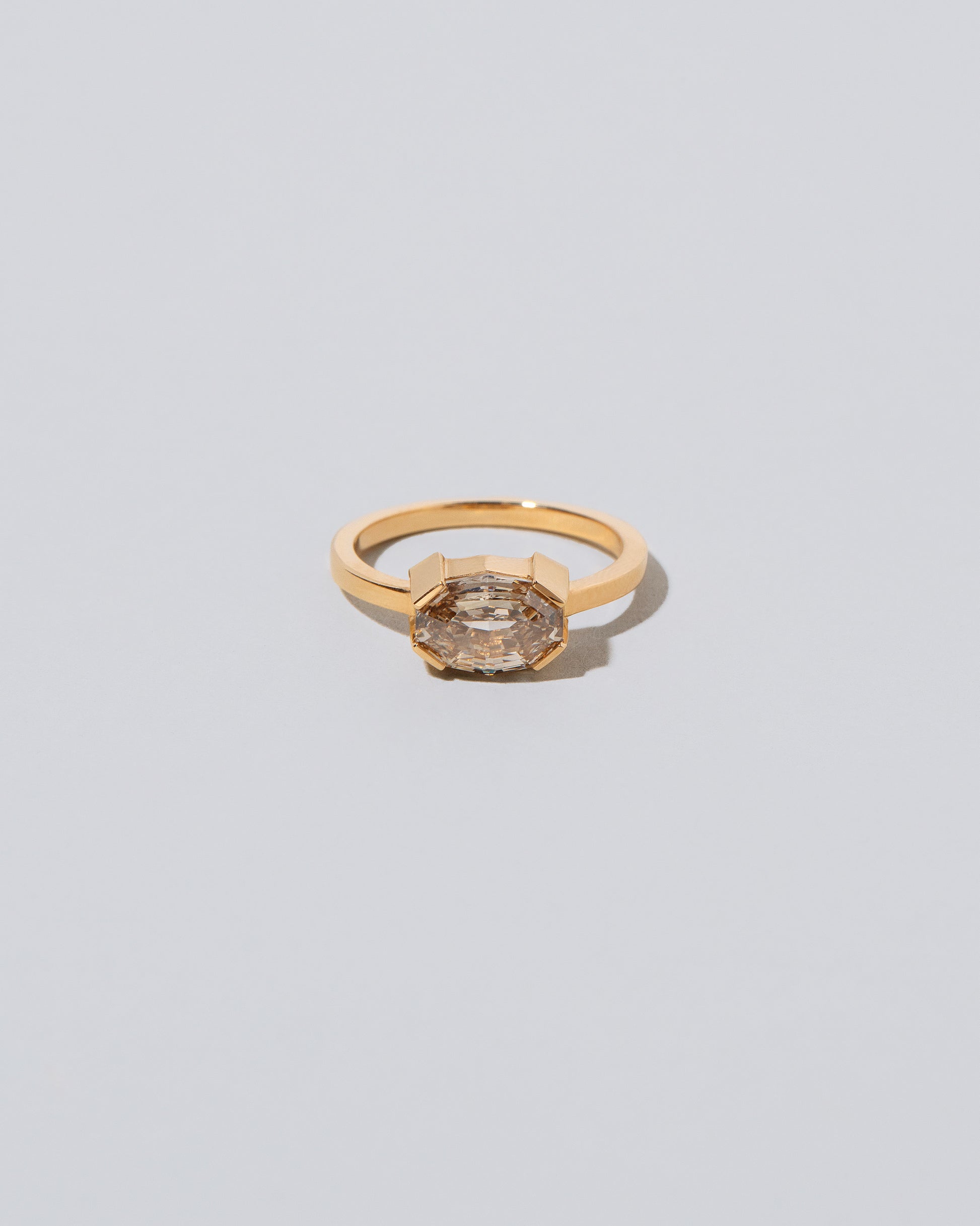 Metis Ring on light color background.