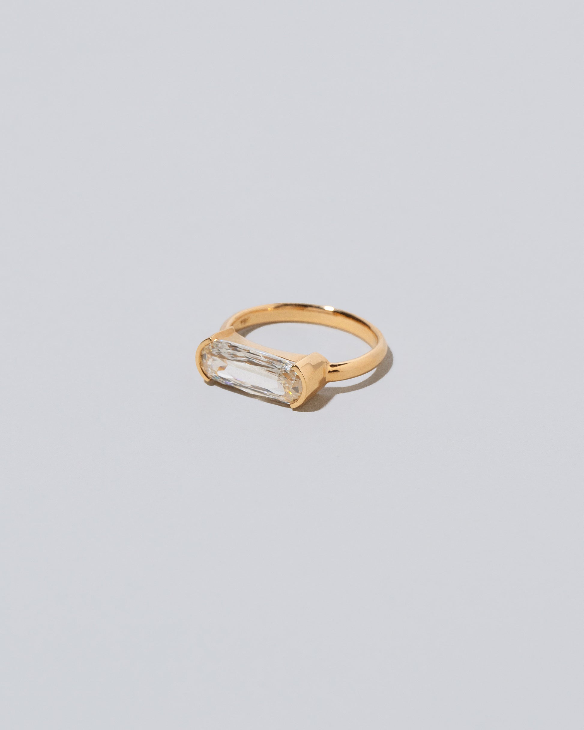 View from the side of the Elara Ring on light color background.