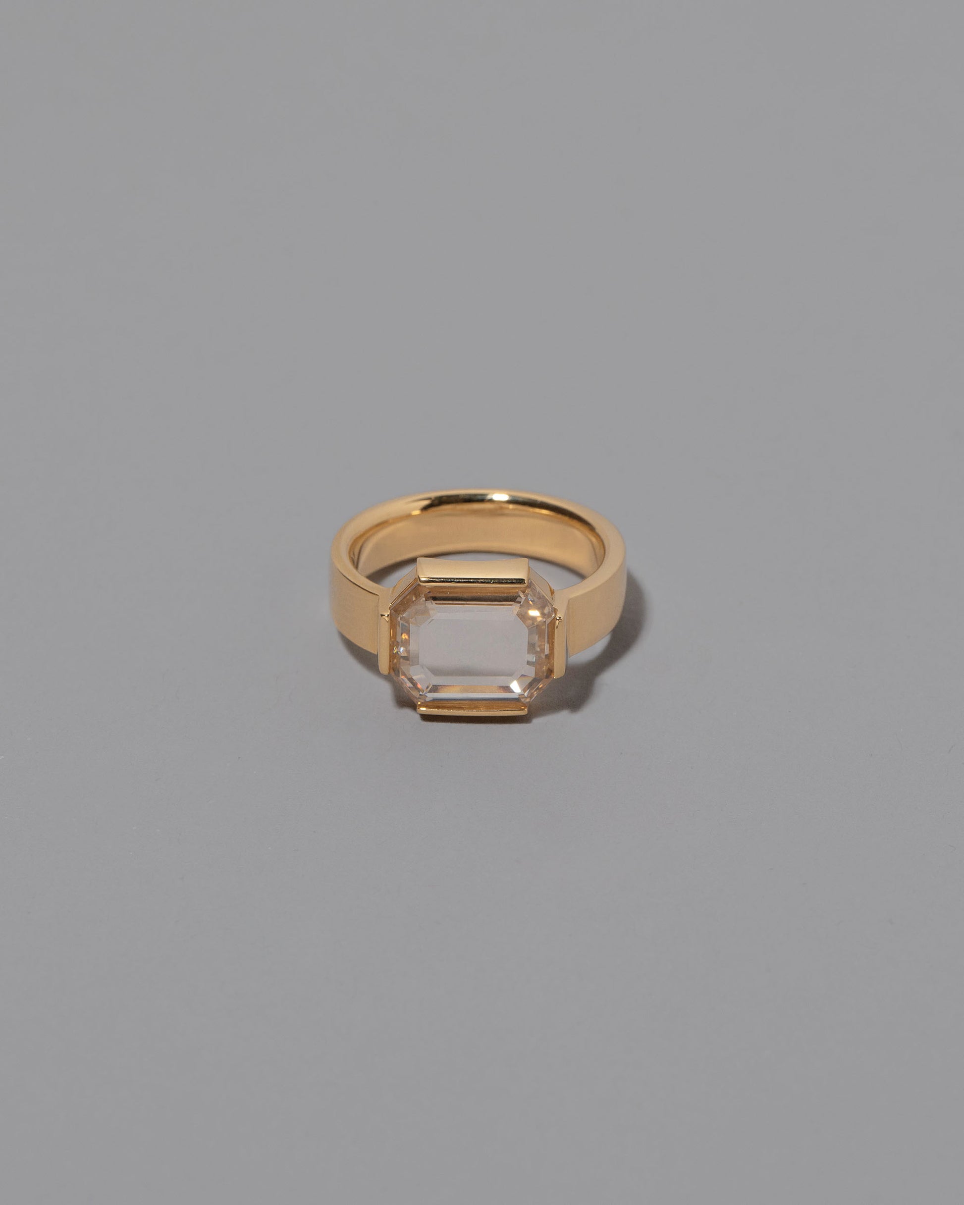 Envelop Ring on grey color background.