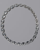 CRZM Sterling Silver Yuba Medium Necklace on light color background.