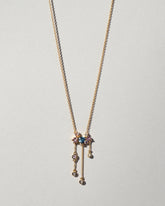  Persephone Necklace on light color background.