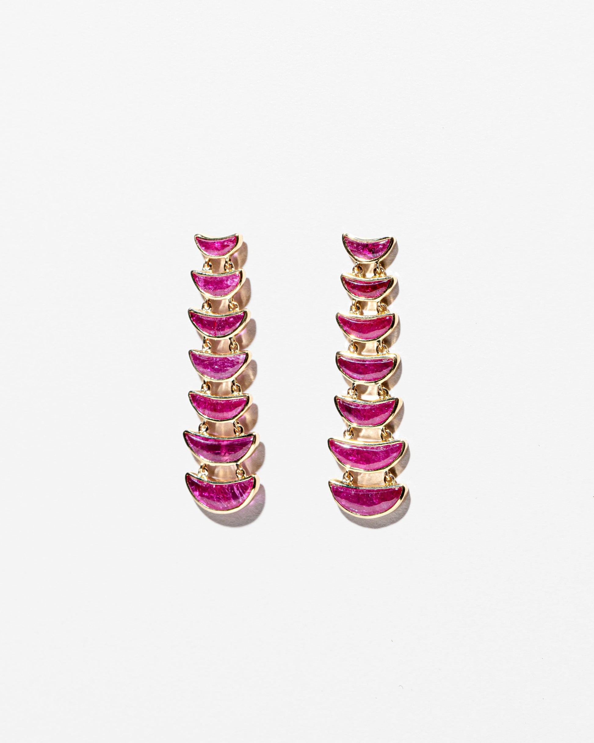 Flame Earrings on light color background.