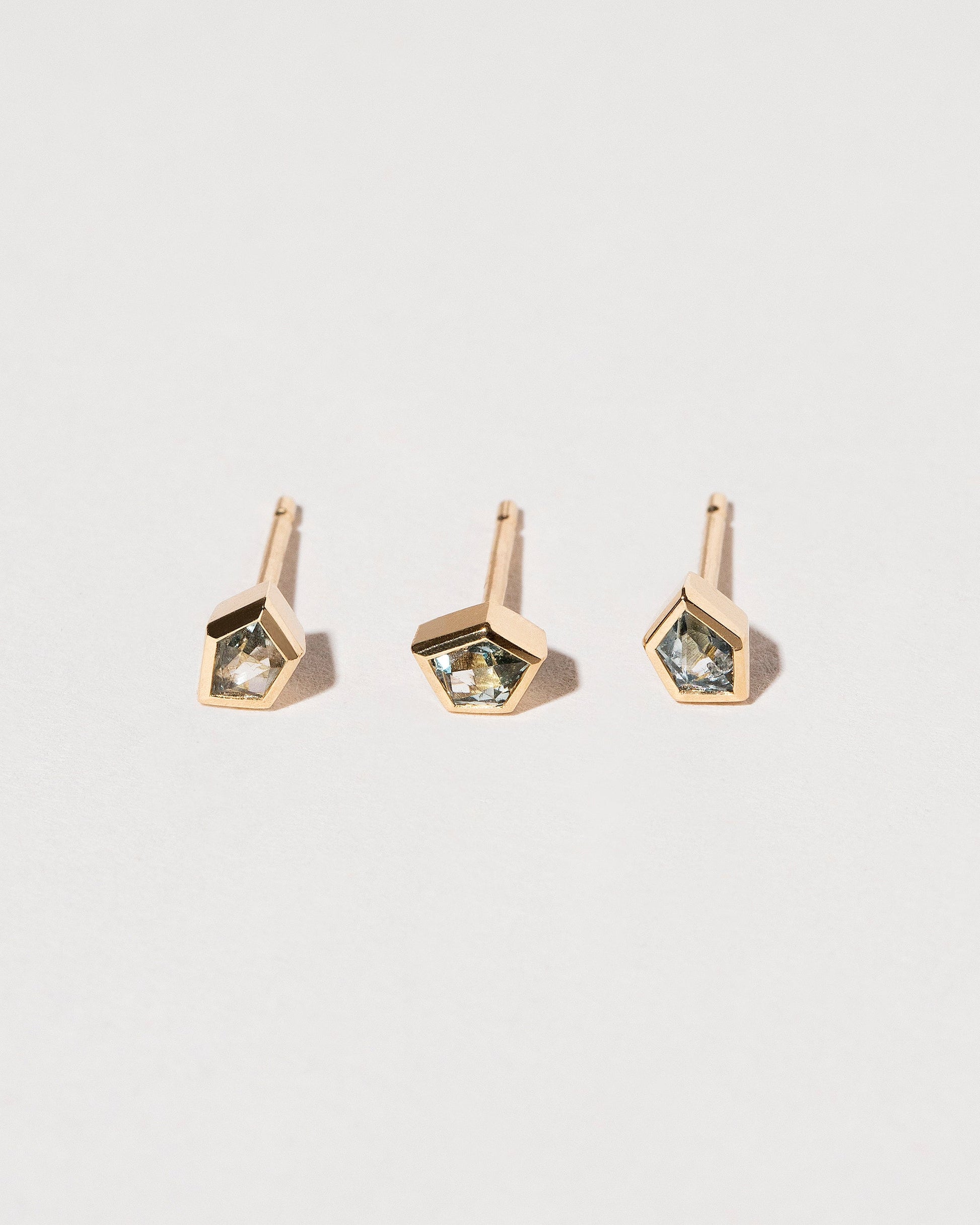  Geo Sapphire Single Stud on light color background.