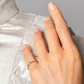 product_details::Rose Cut Purple Diamond Ring on model.