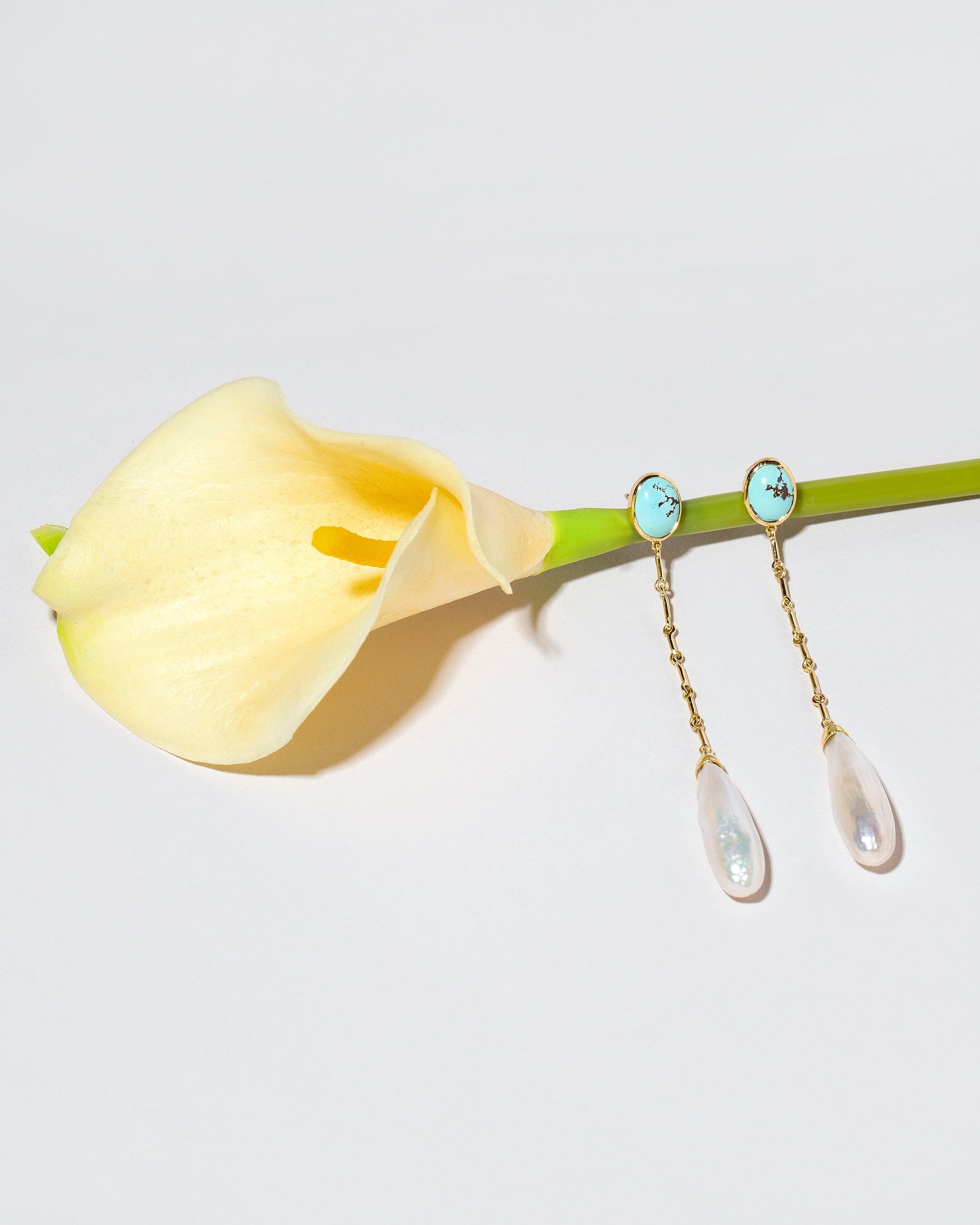  Pearl & Turquoise Shoulder Dusters on light color background.