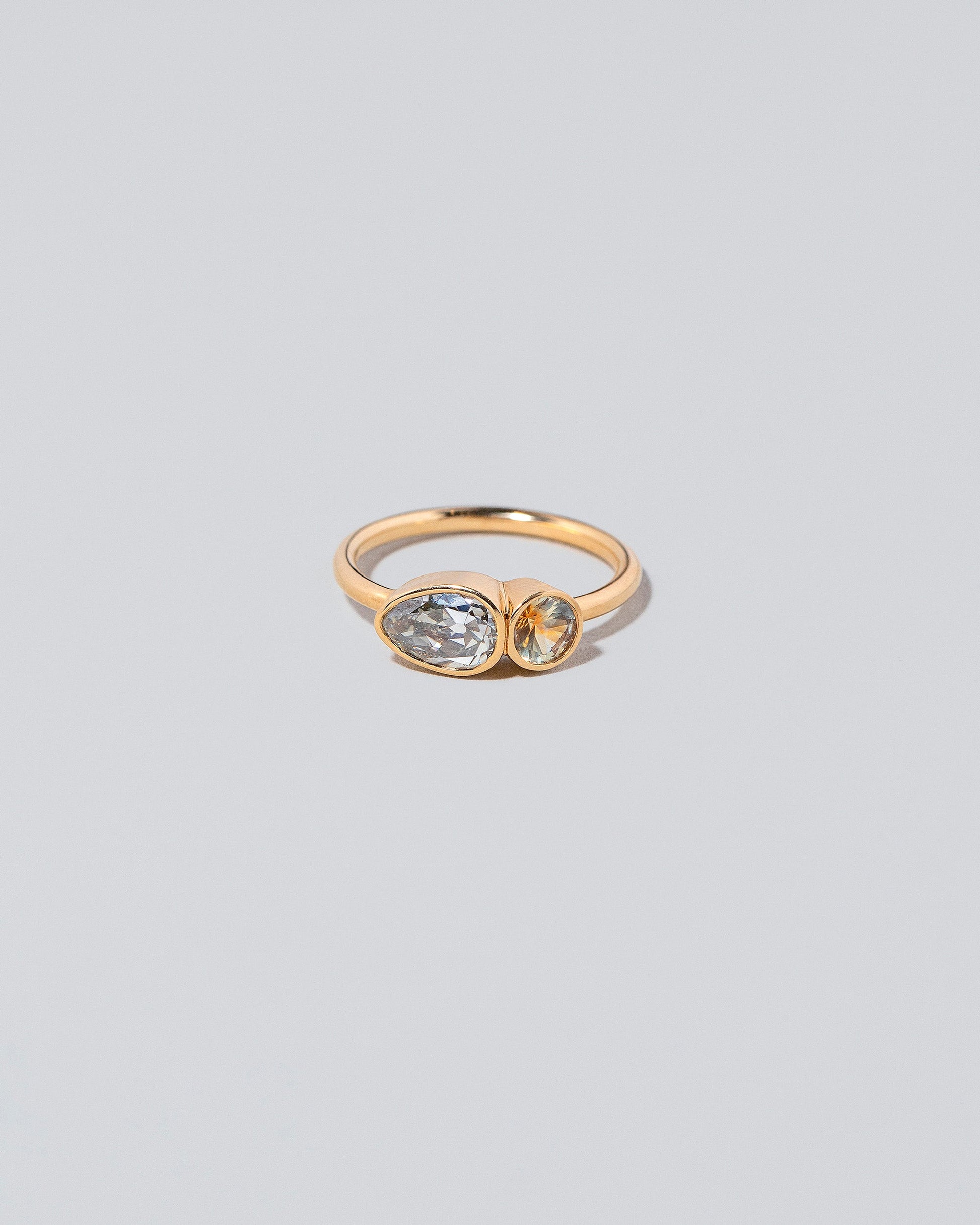  Assal Ring on light color background.