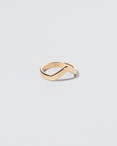 View from the side of the Gold Wide High Peak Band on light color background.