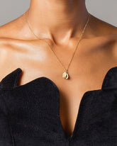 Halved Avocado Charms and Abacus Chain Necklace on model.